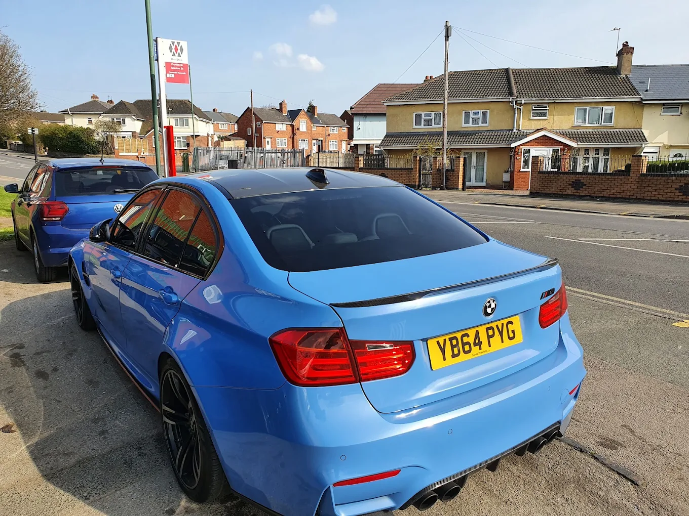 Blue BMW customer car cleaned at Marlow's Street Car Wash